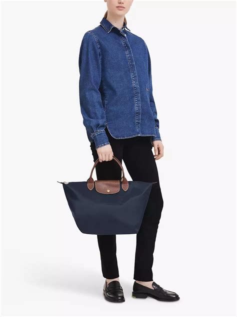 longchamp le pliage medium navy.